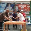 Petinju HS Boxing Camp Sunan Agung Amoragam Teken Kontrak Sabuk Emas di Pattimura International Big Fight 2026